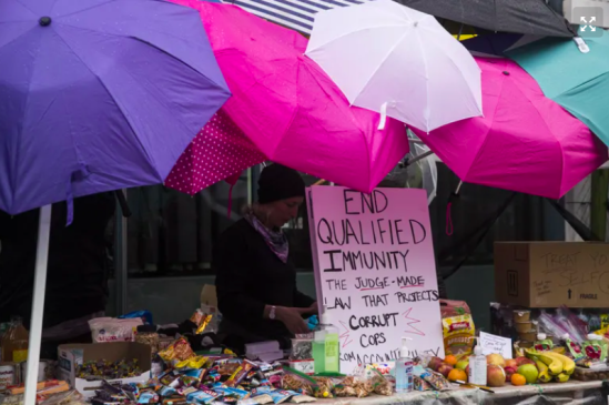 Self-constructed tent made of collected umbrellas at the Capitol Hill Occupied Protest. Source: Seattle Times. 