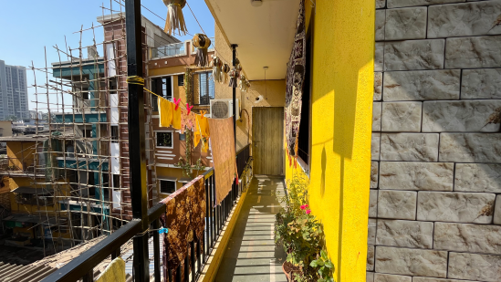 Lobby extending into a partial balcony overlooking the central open space