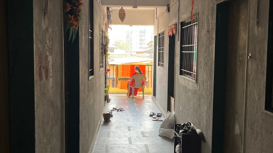 A resident conducting household chores in the lobby
