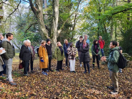 Resident and employee take a walk in existing jungle as part of the workshop by urbz