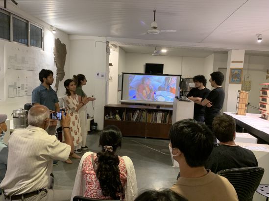 NYUAD students presenting their projects at the Homegrown street exhibition