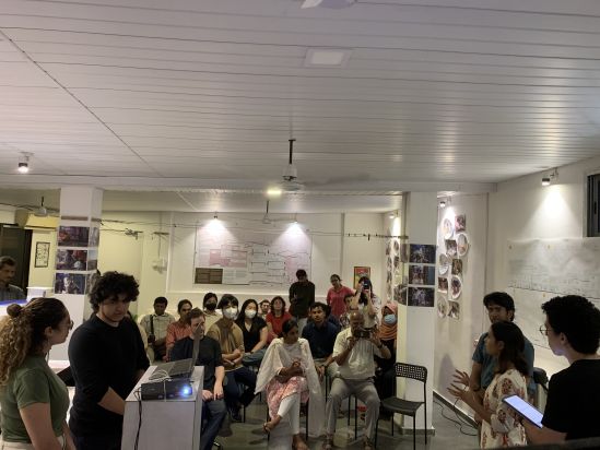 NYUAD students presenting their projects at the Homegrown street exhibition