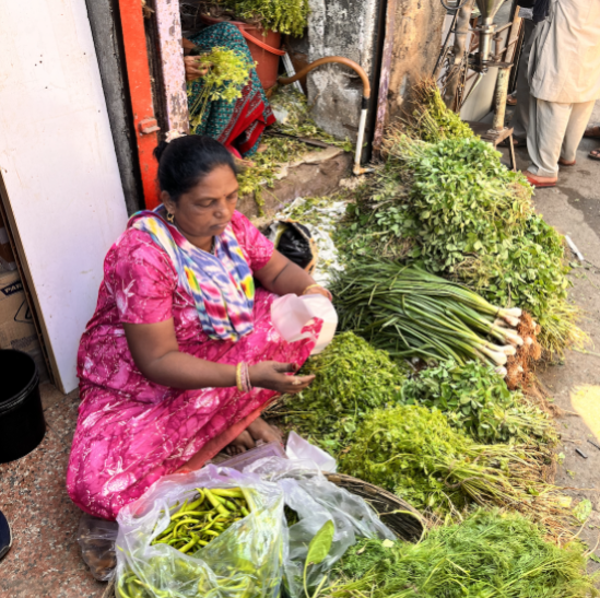  locals in the neighbourhood being interviewed by students