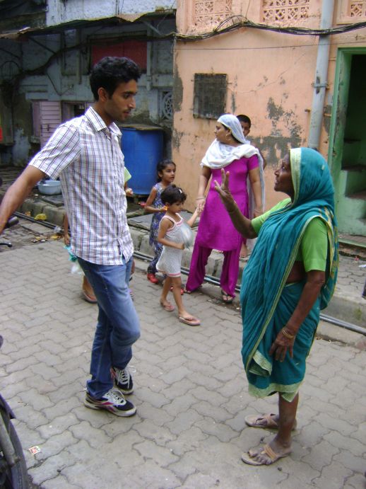 Wasim Khan, a local contractor, in conversation with his site manager.