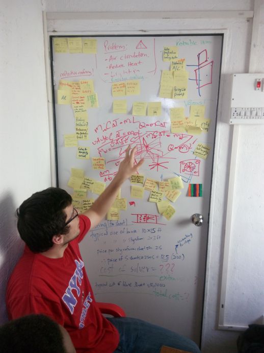 Discussing allocation and usage of space within a house in Dharavi