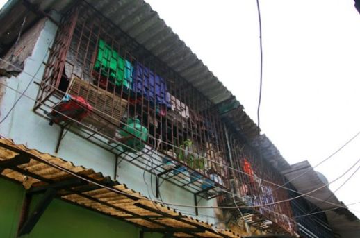 Metal bars over the windows offer an extension to small living spaces   