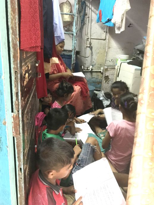 Madhu in her home giving tuition classes