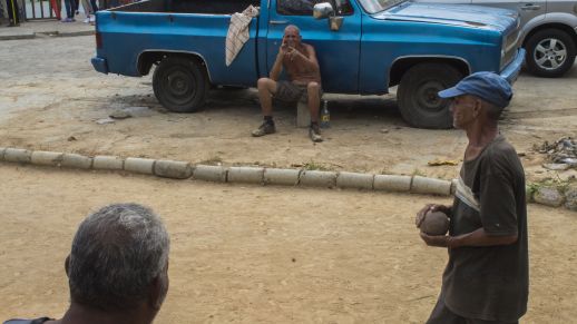 San Blas habitants playing traditional "Bolas Criollas", Photograph by Belkis Campos