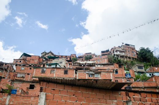 4-5 story homes standing on unstable lands in the San Blas Barrio, Photograph by Stephanie Marcelot.