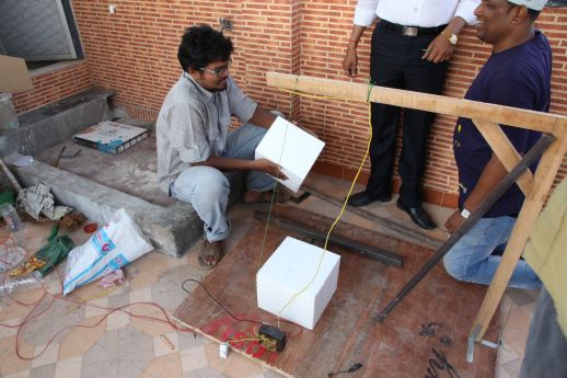 Bharat and Shardul cutting EPS blocks to build the future URBZ office. Extra light construction allow existing houses to be expanded vertically without adding much weight on the structure.