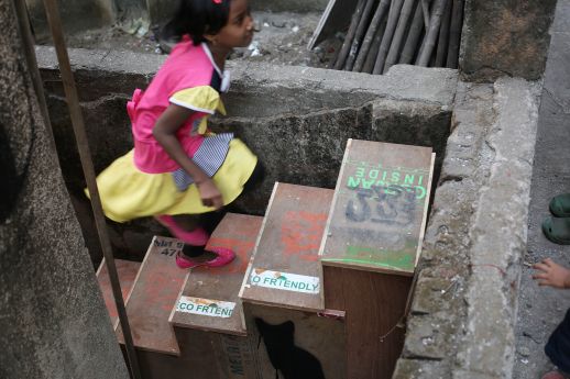 A staircase linking up two chawls through back-alleys, which was built during the workshop.