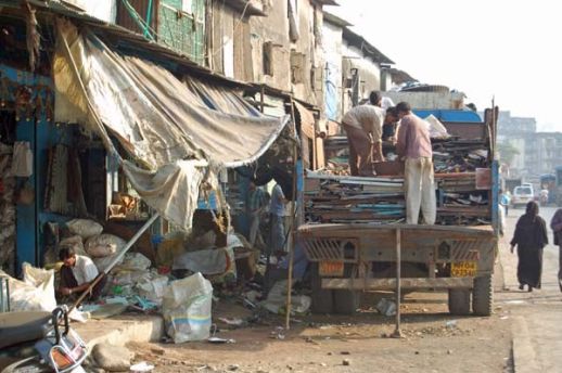 The scrap dealer is unloading his truck. Metals are easy to sort as their properties are very diverse. Copper, brass, and bronze have divergent colours. Aluminium is very light weighted. Iron is magnetic whereas other metals are not.