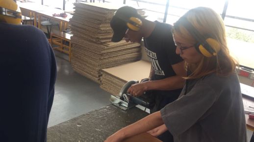 The student volunteers and community members build the smaller structural modules  