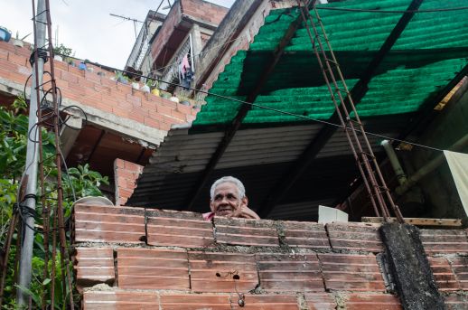 Colombian neighbor of San Blas barrio, he migrated to Venezuela due to violence in his native Colombia in the late 60's. Photograph by Stephanie Marcelot