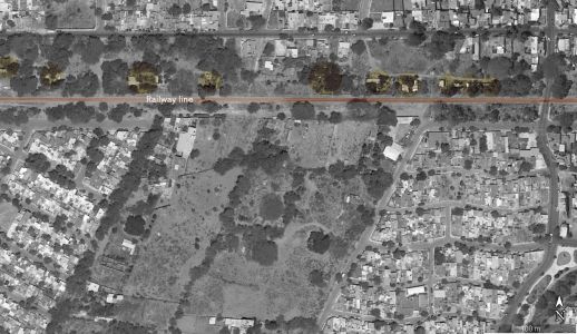 Homegrown settlements located adjacent to the railway line in Colima city.