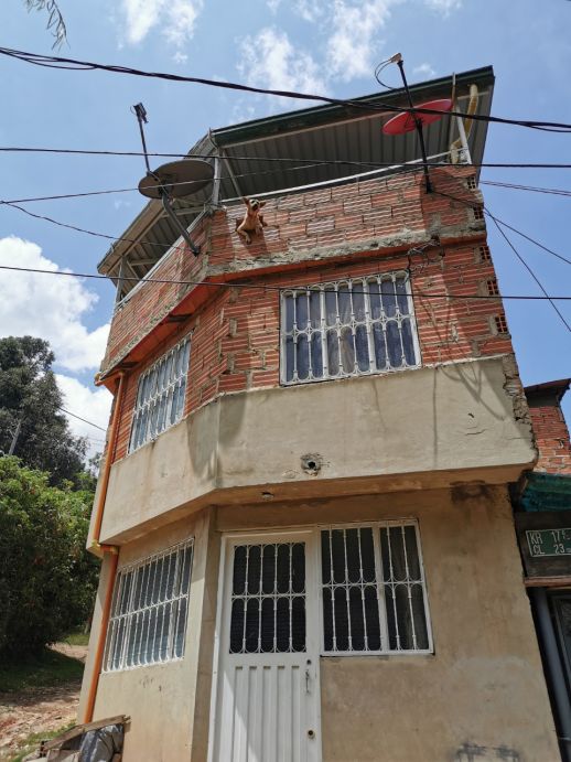 Incremental construction of a home with hollow clay bricks.