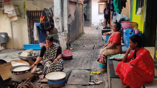 Women coming together and making bhakris in the smaller chowks.